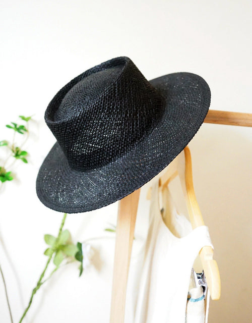 Black straw flat hat for women in summer sun protection and sun protection on the beach woven straw hat with wide brim